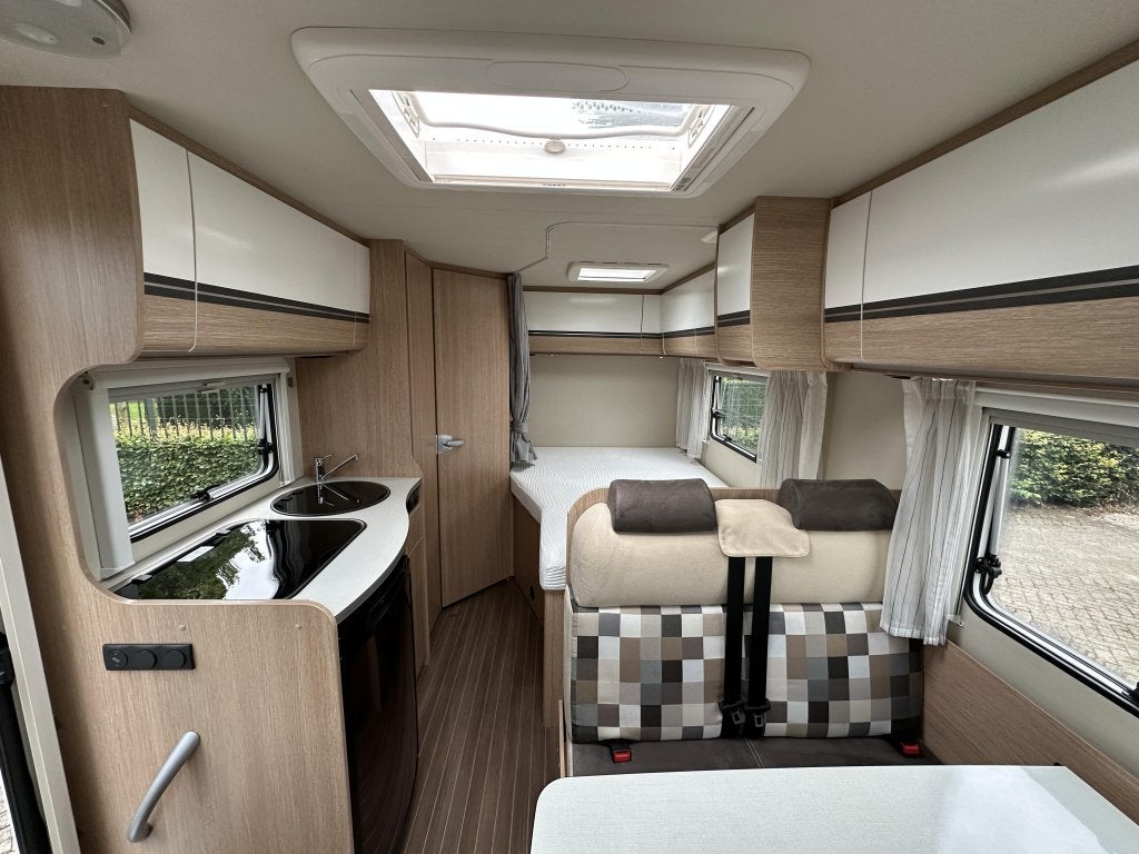 Sunlight T 58, Caravans en Kamperen, Campers, Standaard zit, Sunlight, Ringverwarming, Hordeur