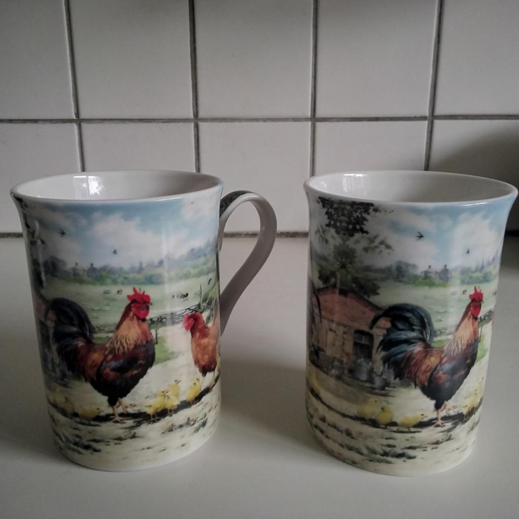Uit de Leonardo collection  2 mokken : cockerel +hen, Huis en Inrichting, Ophalen of Verzenden, Nieuw, Overige stijlen, Kop(pen) en/of Schotel(s)