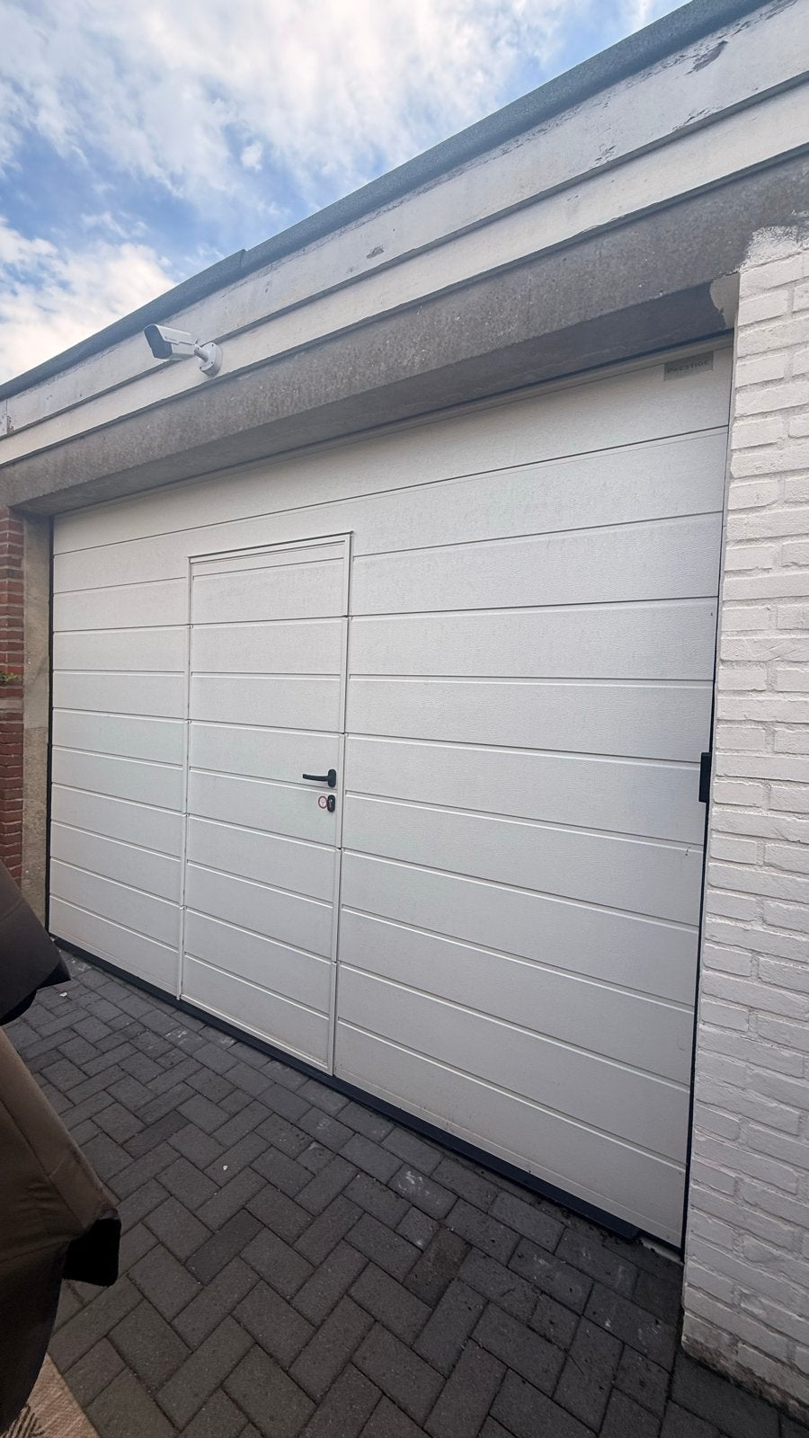 Garagedeur met loopdeur