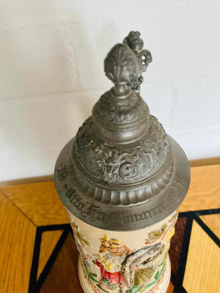 Antieke Duitse bierpul met tinnen deksel, Ophalen