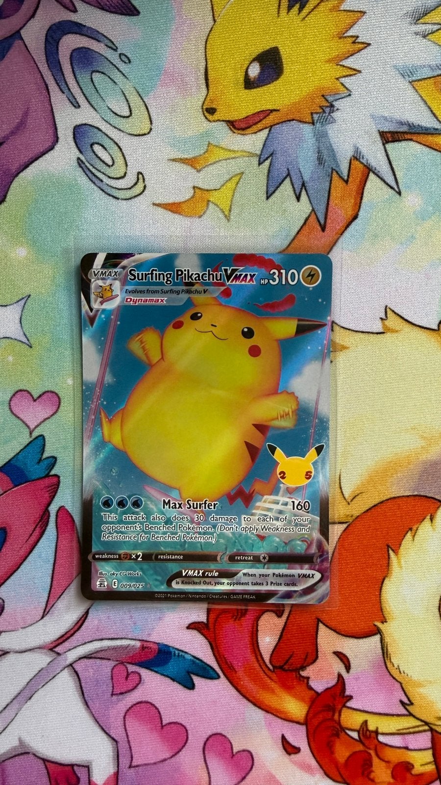 Pokemon Surfing Pikachu VMAX 009/025 Celebrations, Hobby en Vrije tijd, Verzamelkaartspellen | Pokémon, Verzenden, Zo goed als nieuw