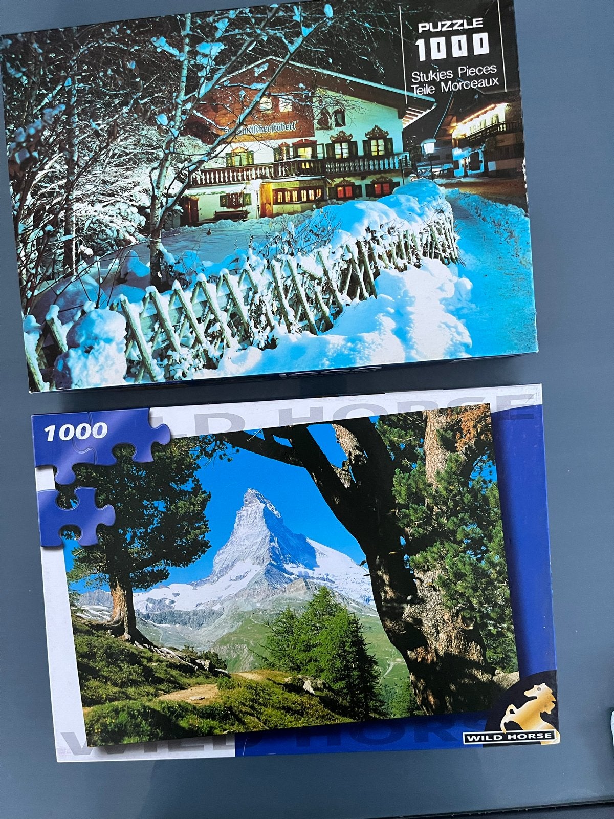 2 Legpuzzels 1000 stukjes - Winterlandschap & Matterhorn, Ophalen of Verzenden, 500 t/m 1500 stukjes, Gebruikt, Legpuzzel