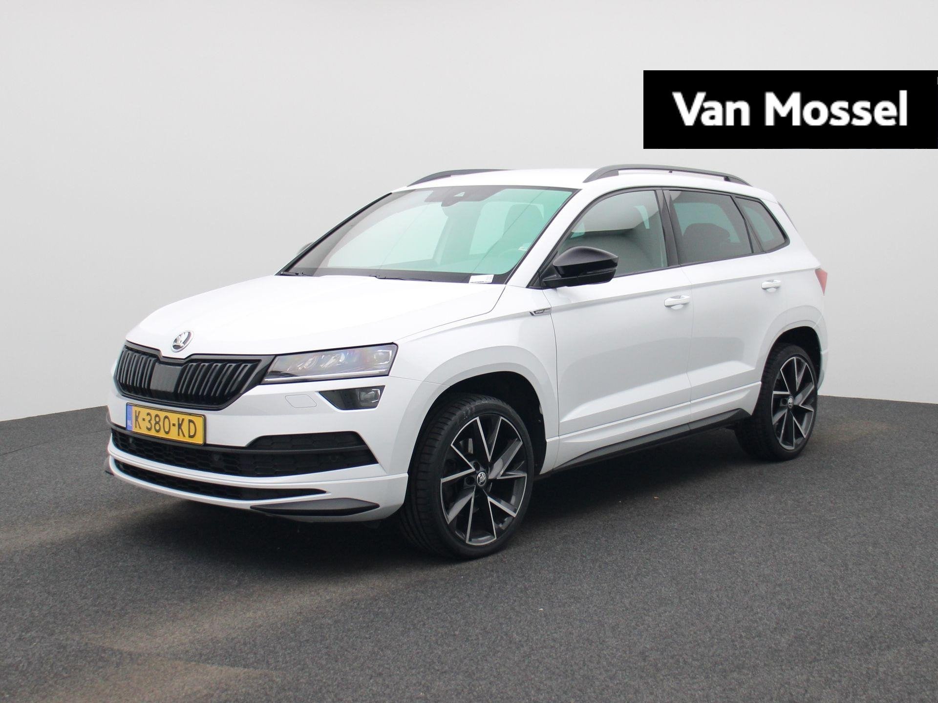 Skoda Karoq 1.5 TSI ACT Sportline Business 150 PK | Automaat, Stof, 4 cilinders, Wit, Bedrijf