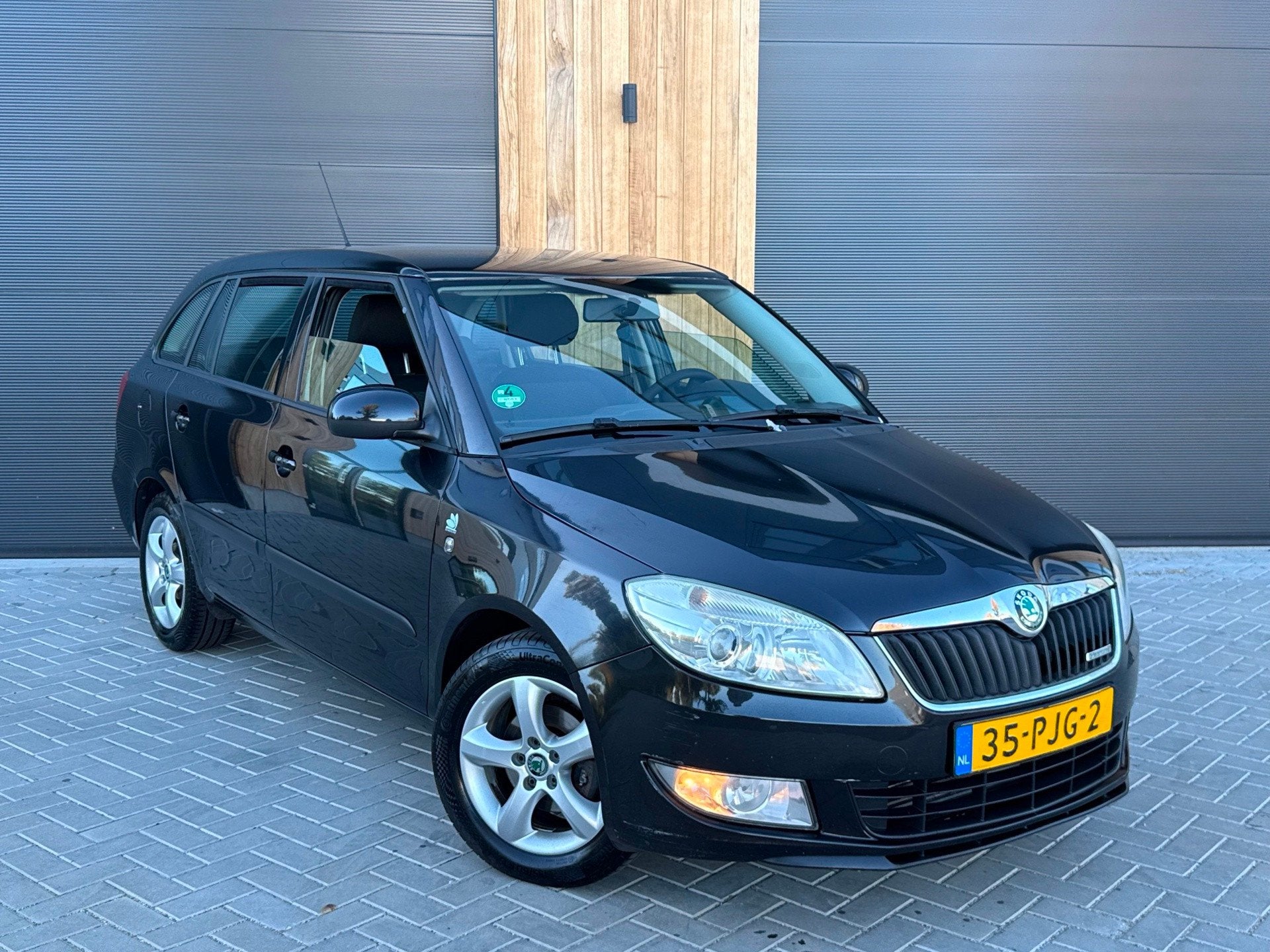 Skoda Fabia Combi 1.2 TDI Greenline (bj 2011) Airco/Cruise c, Auto's, Voorwielaandrijving, Euro 5, 1199 cc, Zwart