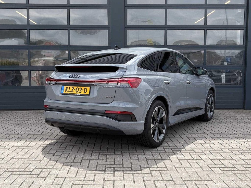 Audi Q4 Sportback e-tron 45 286pk quattro Edition 82 kWh | M, Auto's, Audi, Automaat, 12 maanden, Stof, Zwart