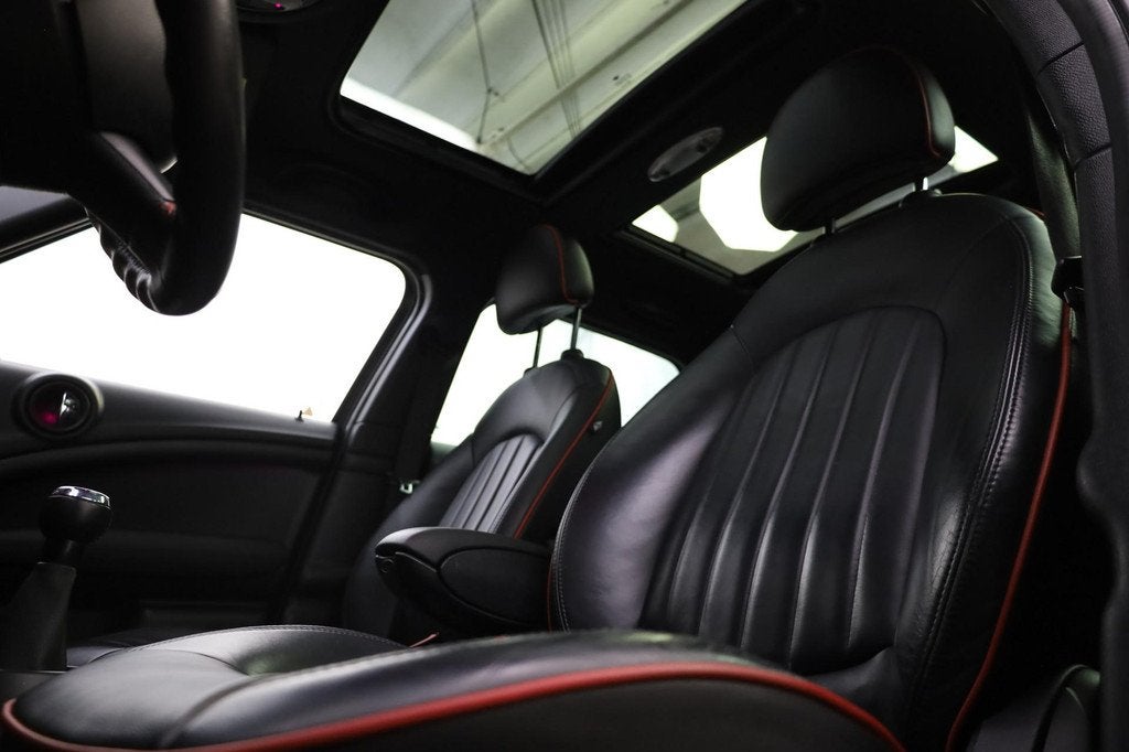 MINI Mini Countryman 1.6 John Cooper Works ALL4 Chili | Airc, Auto's, Mini, Euro 5, 1380 kg, Gebruikt, Zwart