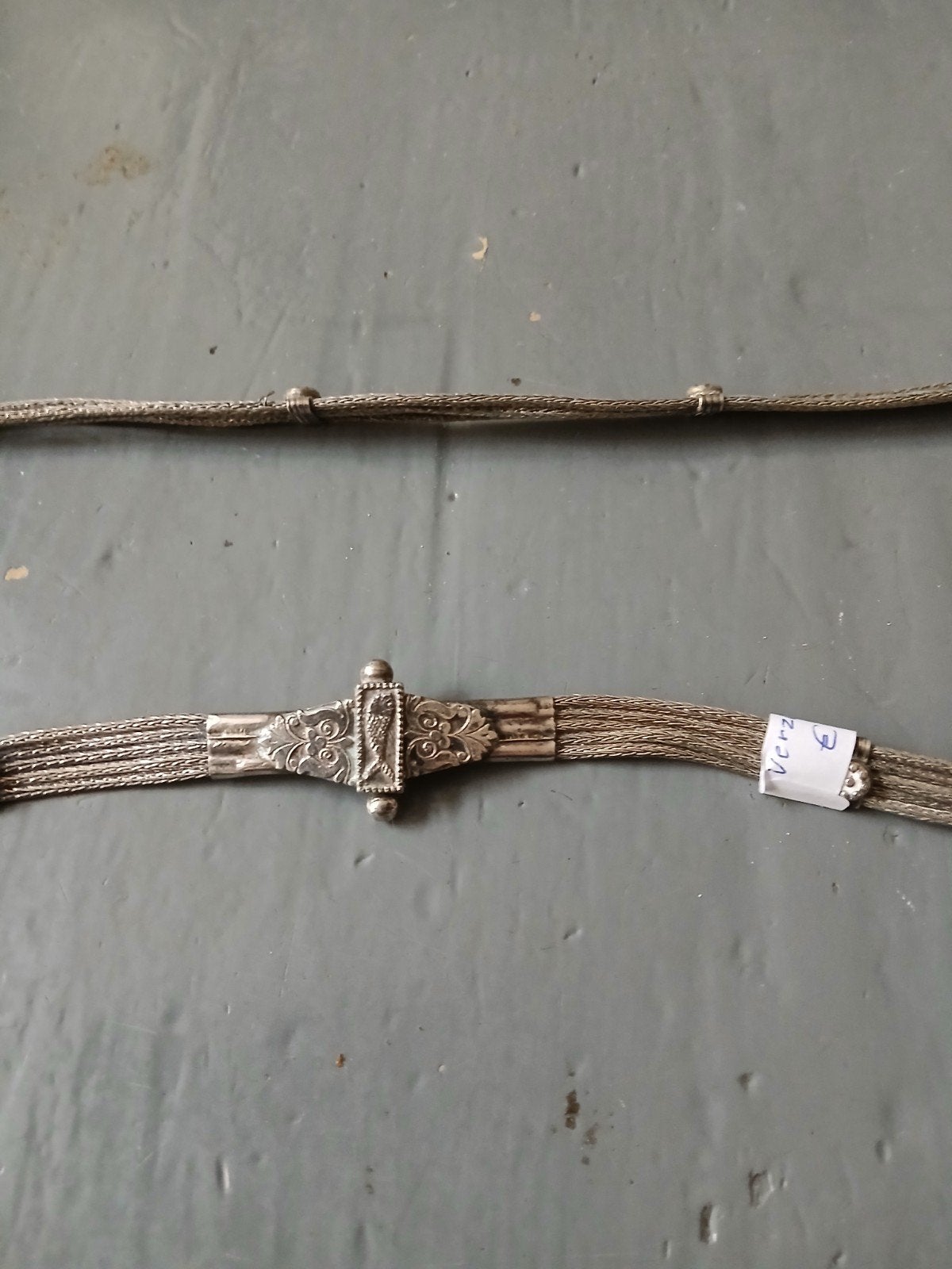 Verzilverde tailleband riem, Ophalen