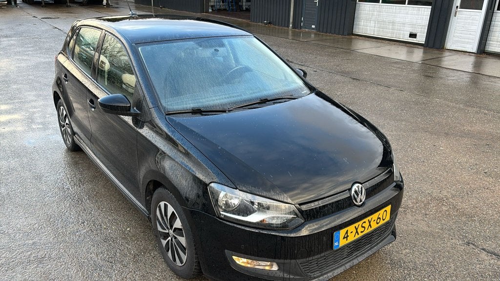 Volkswagen Polo 1.4 TDI 55KW BMT 2014 Zwart, Auto's, Voorwielaandrijving, Stof, 74 pk, 580 kg