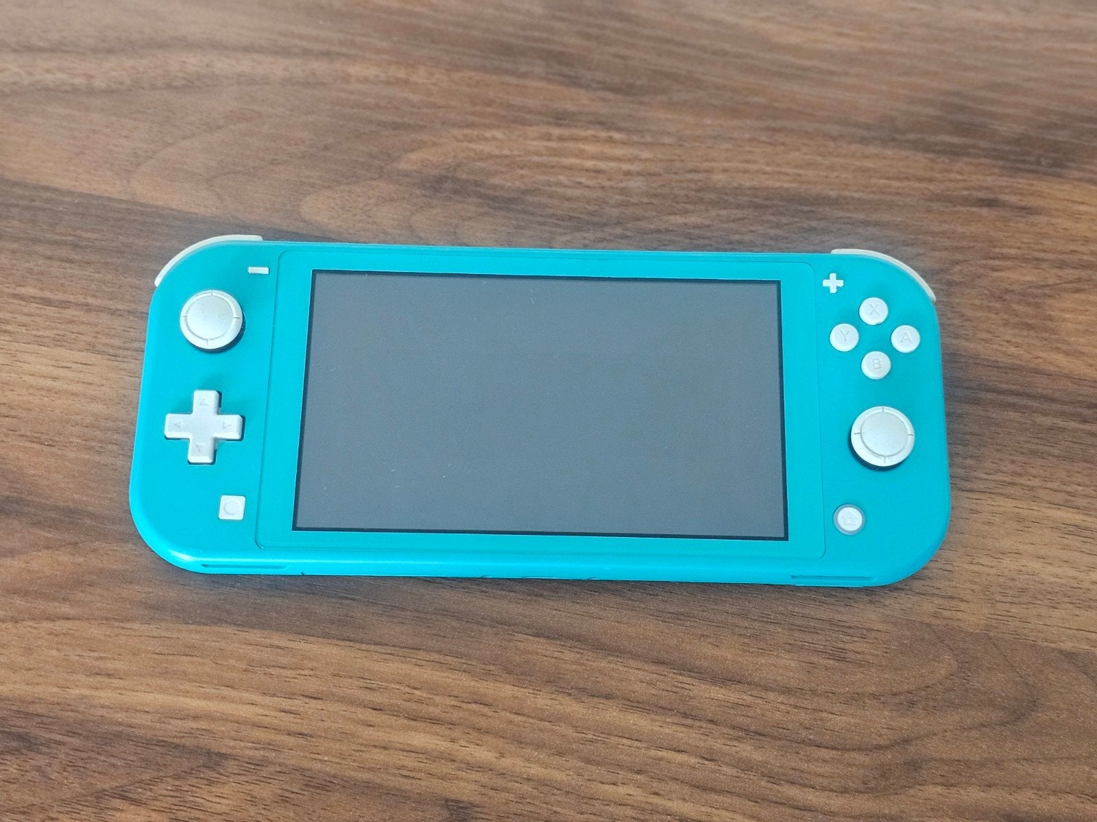 Nintendo Switch Lite Turquoise + Originele Oplader, Ophalen of Verzenden, Turquoise, Gebruikt
