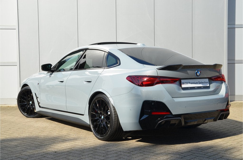 BMW i4 eDrive40 M Sport / Schuif-kanteldak / Adaptieve LED /, Auto's, BMW, Achterwielaandrijving, Met garantie (alle), 2020 kg
