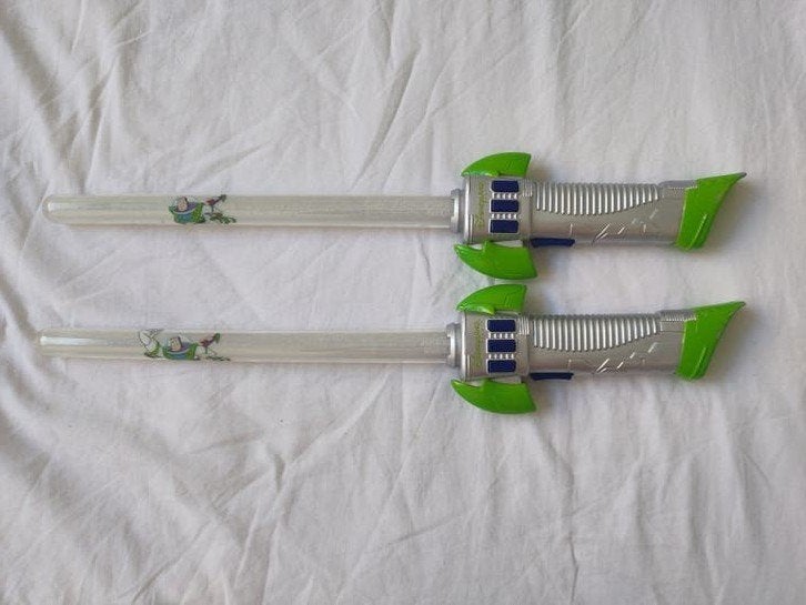 Buzz Lightyear Lichtzwaarden - Set van 2, Ophalen of Verzenden, Gebruikt