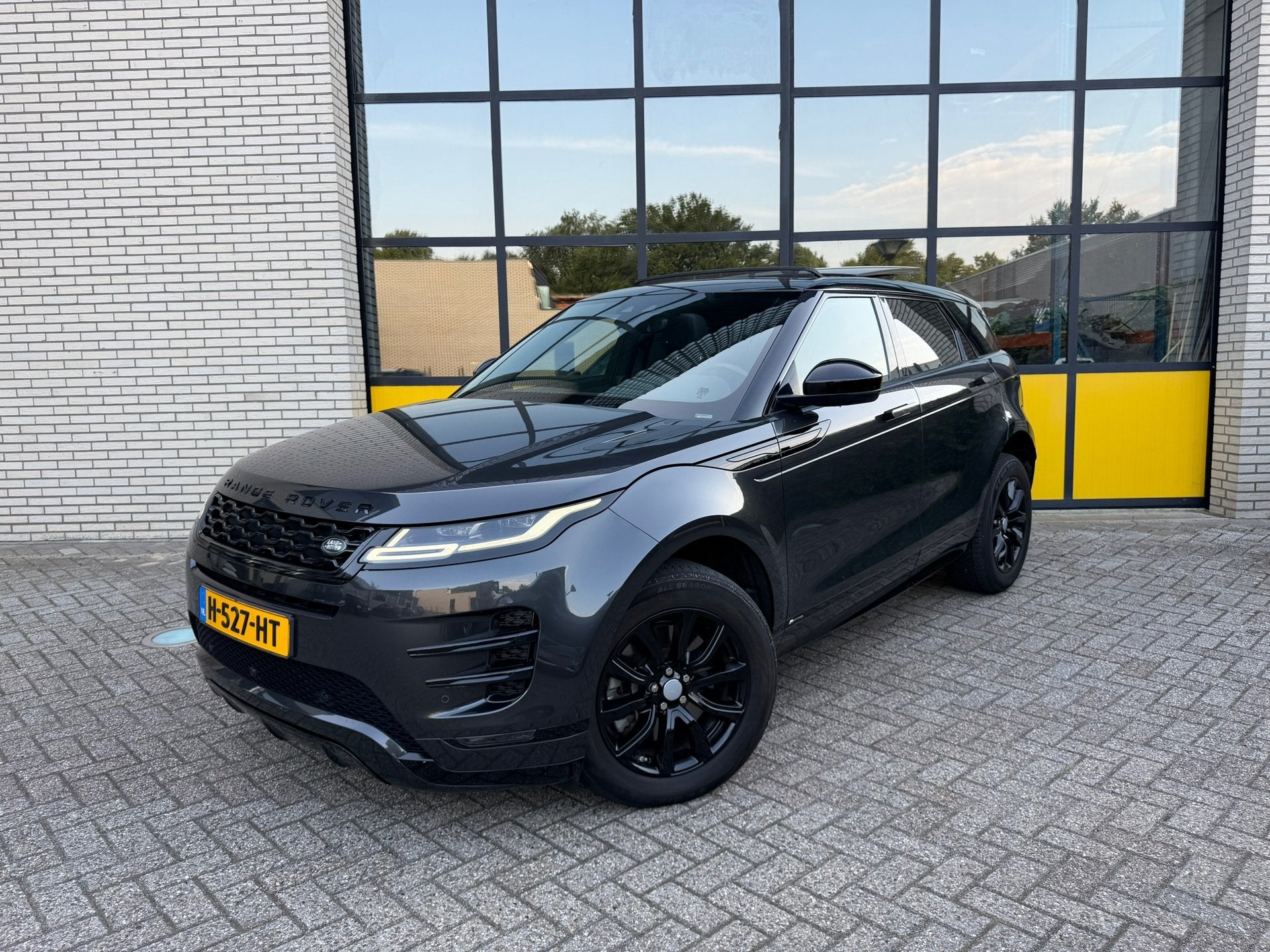 Land Rover Range Rover Evoque 2.0 P200 AWD R-Dynamic, Schuif, Auto's, Land Rover, 1800 kg, 4 cilinders, Automatische klimaatregeling