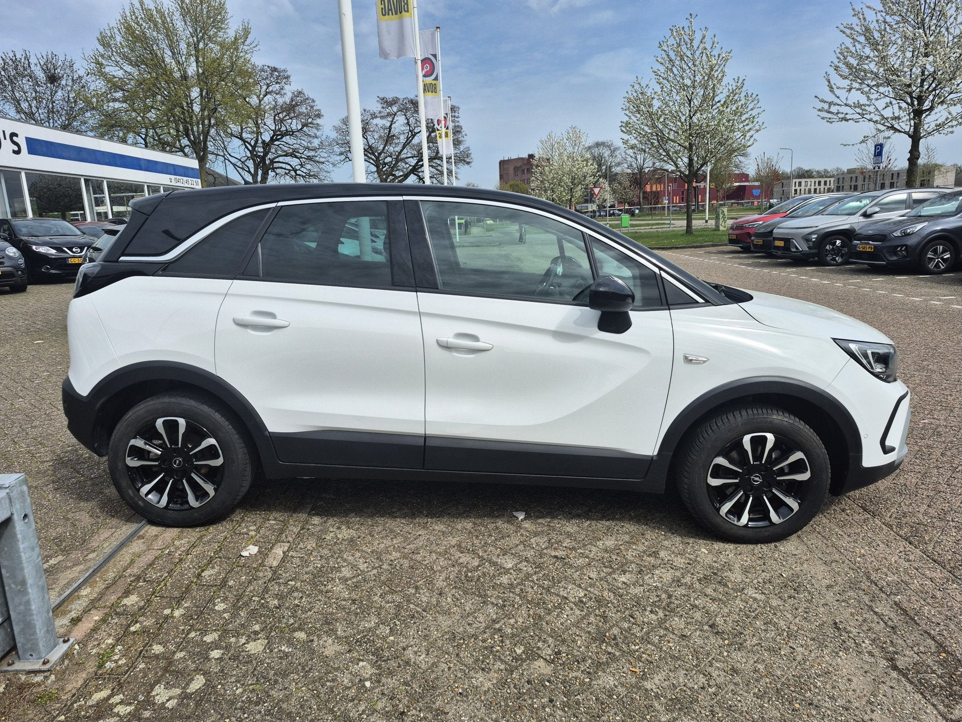 Opel Crossland 1.2 Turbo Elegance (10x op voorraad!), Auto's, Gebruikt, Euro 6, 1199 cc, Wit