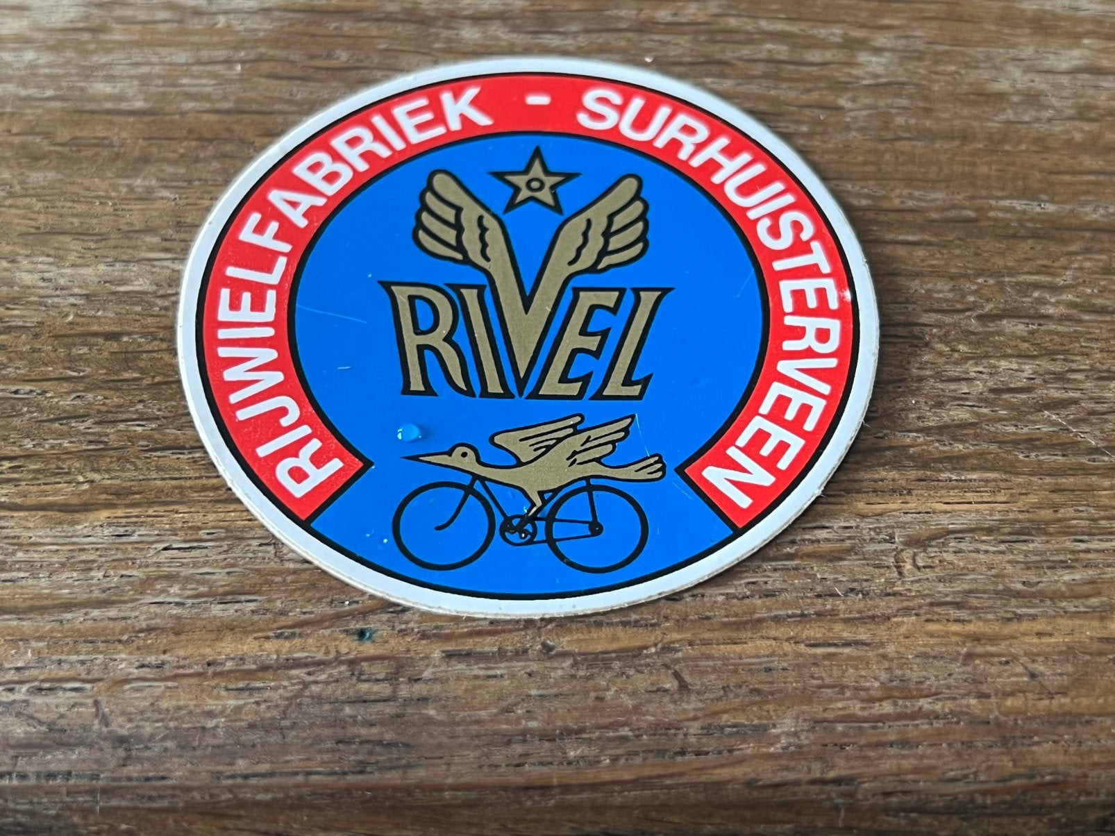 Vintage sticker RIVEL  Rijlwielfabriek Sushuisterveen, Ophalen of Verzenden, Zo goed als nieuw, Gebruiksvoorwerp
