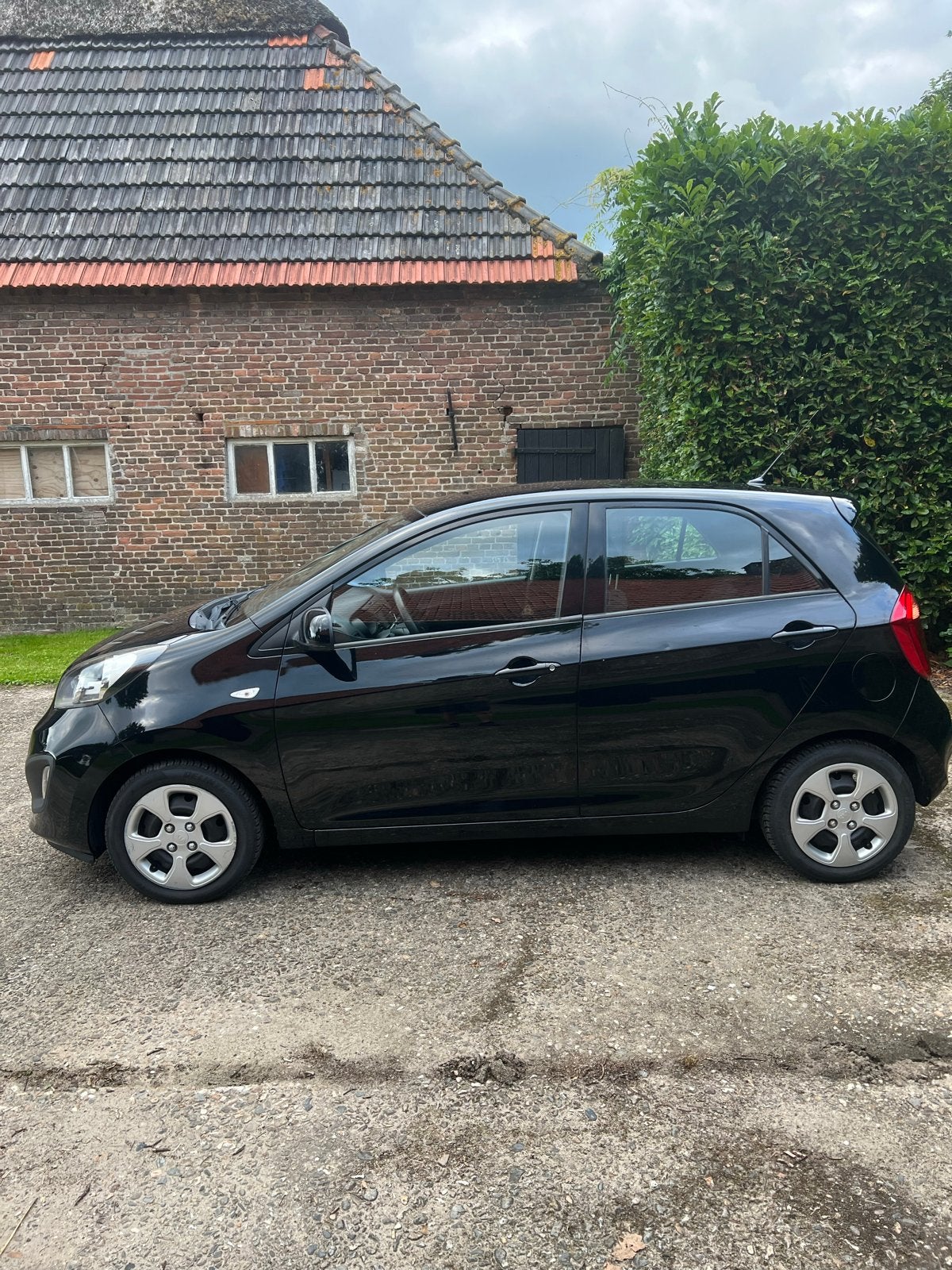 Nette Kia Picanto 1.0 Cvvt 5-DRS 2013 Zwart 140d KM Airco, Voorwielaandrijving, Stof, Zwart, 400 kg