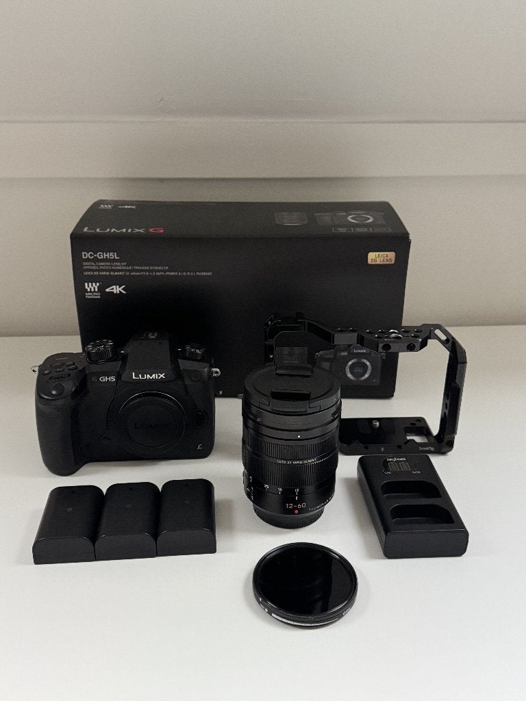 Panasonic Lumix GH5 + Leica DG 12-60mm f/2.8-4.0 + cage, Gebruikt, Panasonic, Ophalen of Verzenden, Bodydop