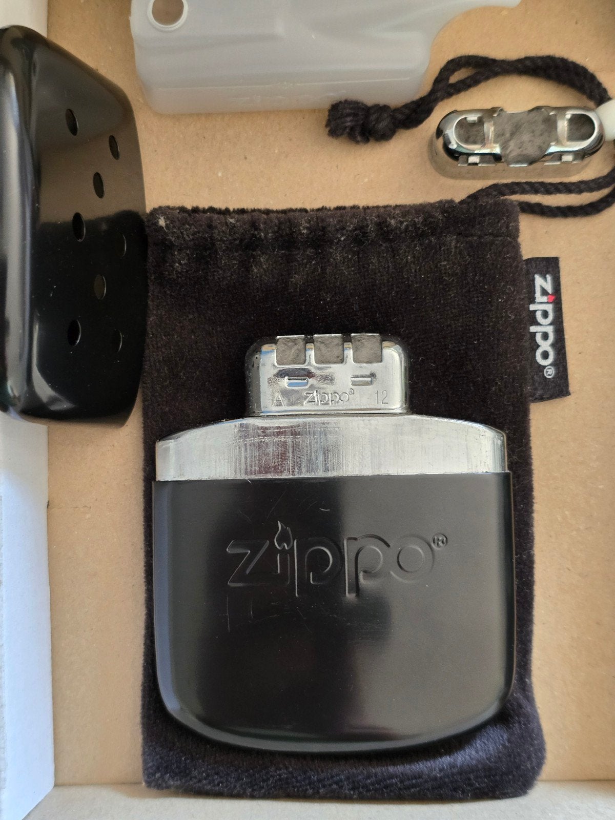 Zippo Handwarmer met accessoires en brandstof, Ophalen of Verzenden, Gebruikt, Aansteker