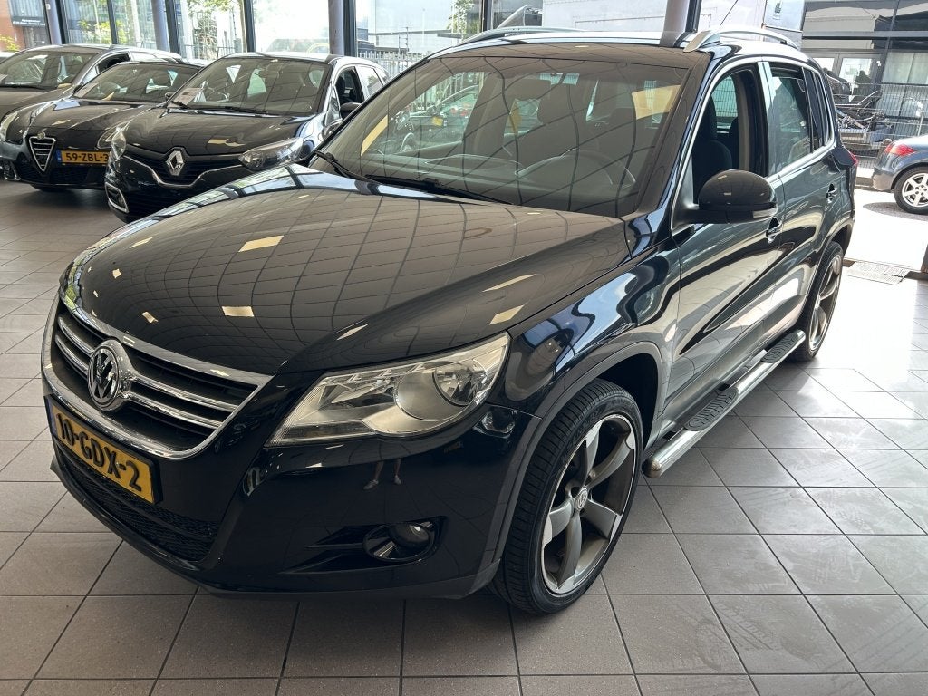 Volkswagen Tiguan 1.4 TSI Sport&St. 4M Achteruit rij Cam NW, Auto's, Gebruikt, 4 cilinders, Zwart, Origineel Nederlands