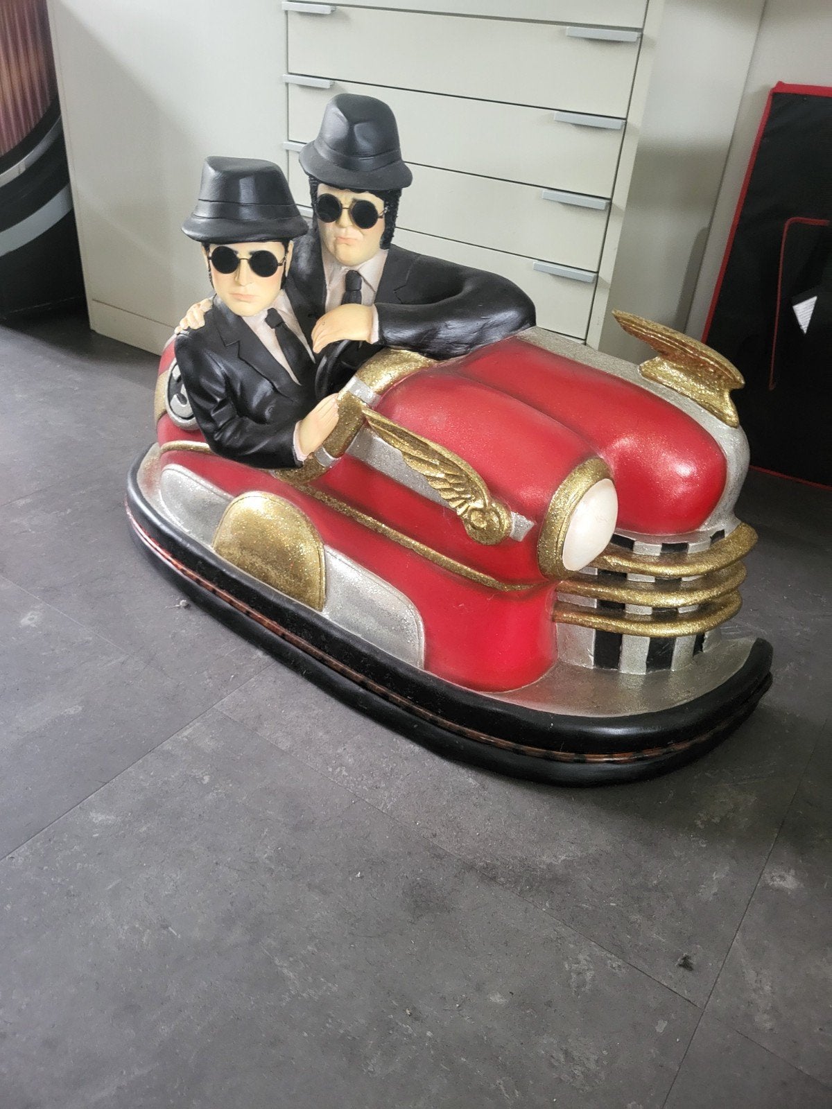 De bluesbrothers in een bots auto., Ophalen