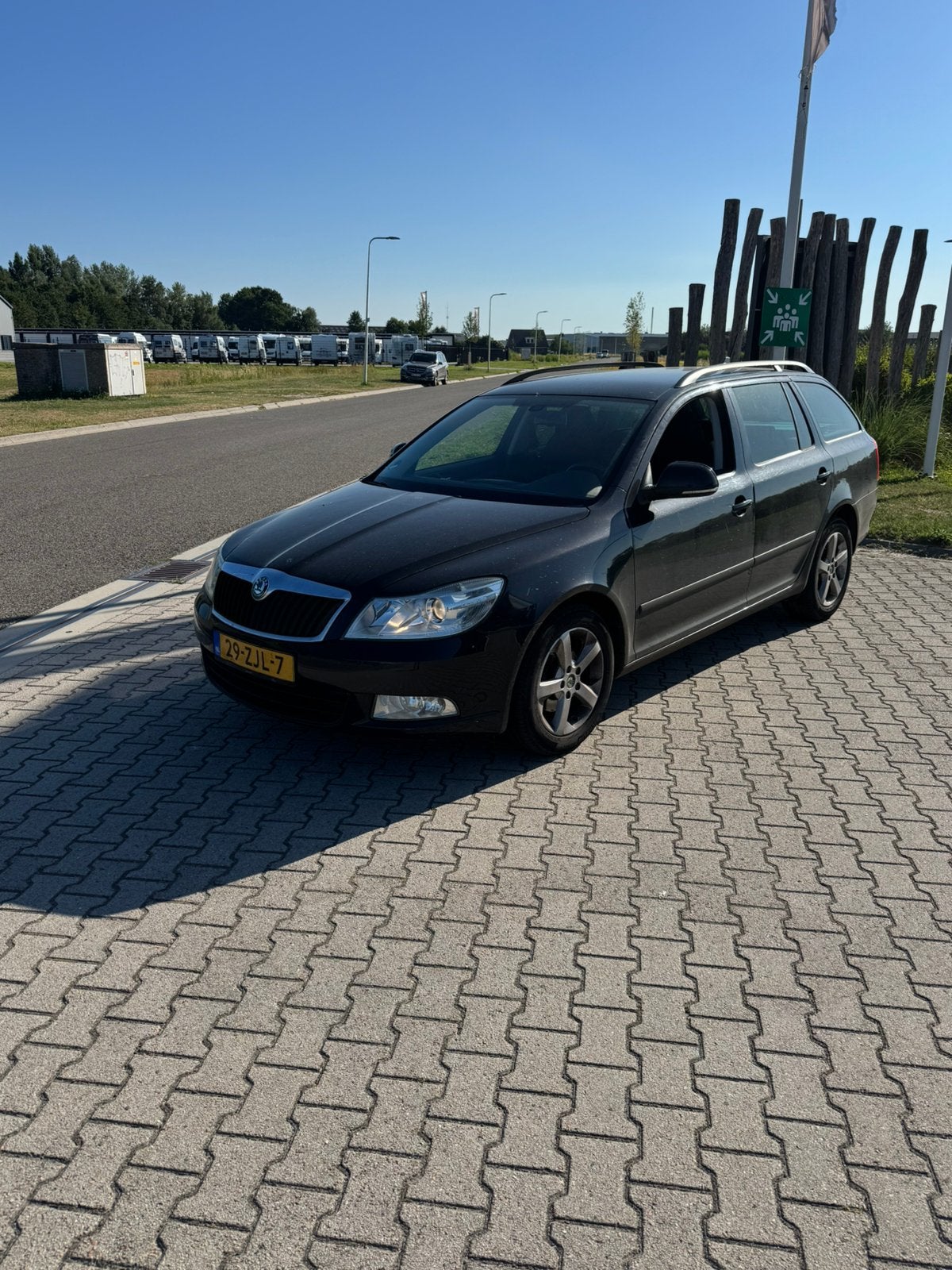 Skoda Octavia 1.6 TDI 77KW Combi Greentech 2012 Zwart, Voorwielaandrijving, 4 cilinders, Zwart, Origineel Nederlands