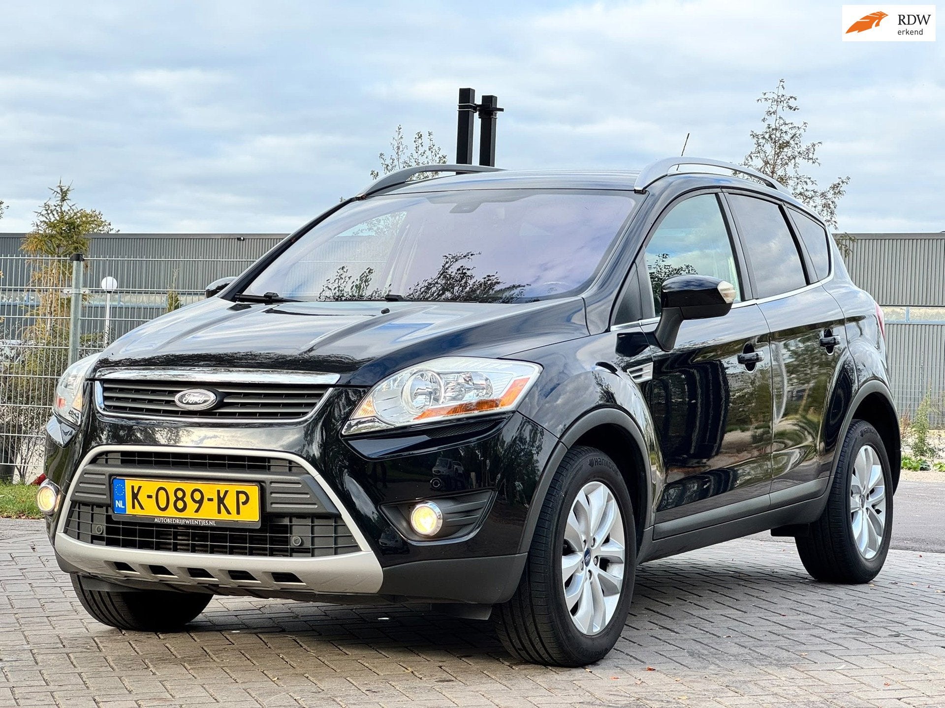 Ford Kuga 2.5 20V Titanium|200PK|AWD|AUT|NAVI|PSENSOR|TREKHA, Auto's, Automaat, 1553 kg, Leder en Stof, 10 km/l