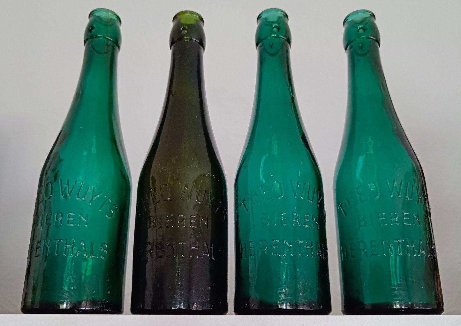 Vintage bierflesjes Theo Wuyts Herenthals., Ophalen of Verzenden