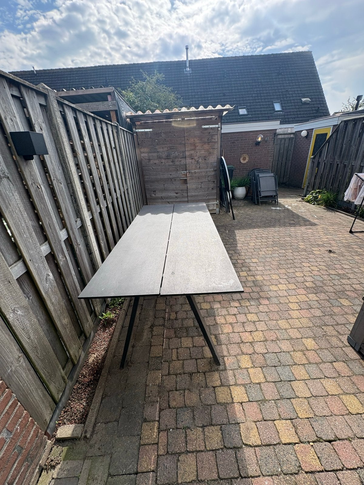 Grote zwarte tuintafel - Gebruikt, Tuin en Terras, Ophalen of Verzenden, Gebruikt, Rechthoekig, Overige materialen