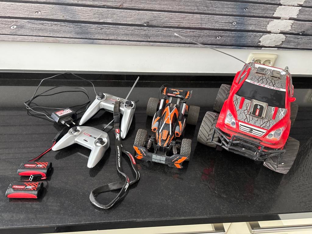 Twee Carrera RC auto's met accu's en oplader, Elektro, Gebruikt, Auto offroad, Ophalen of Verzenden
