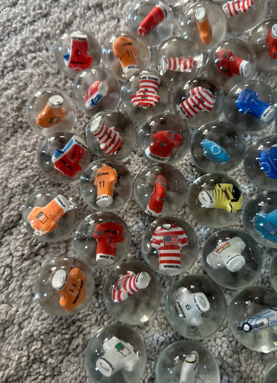 WK 2014 knikkers met voetbalshirts 70 stuks, Ophalen of Verzenden, Nieuw, Overige sporten, Overige typen
