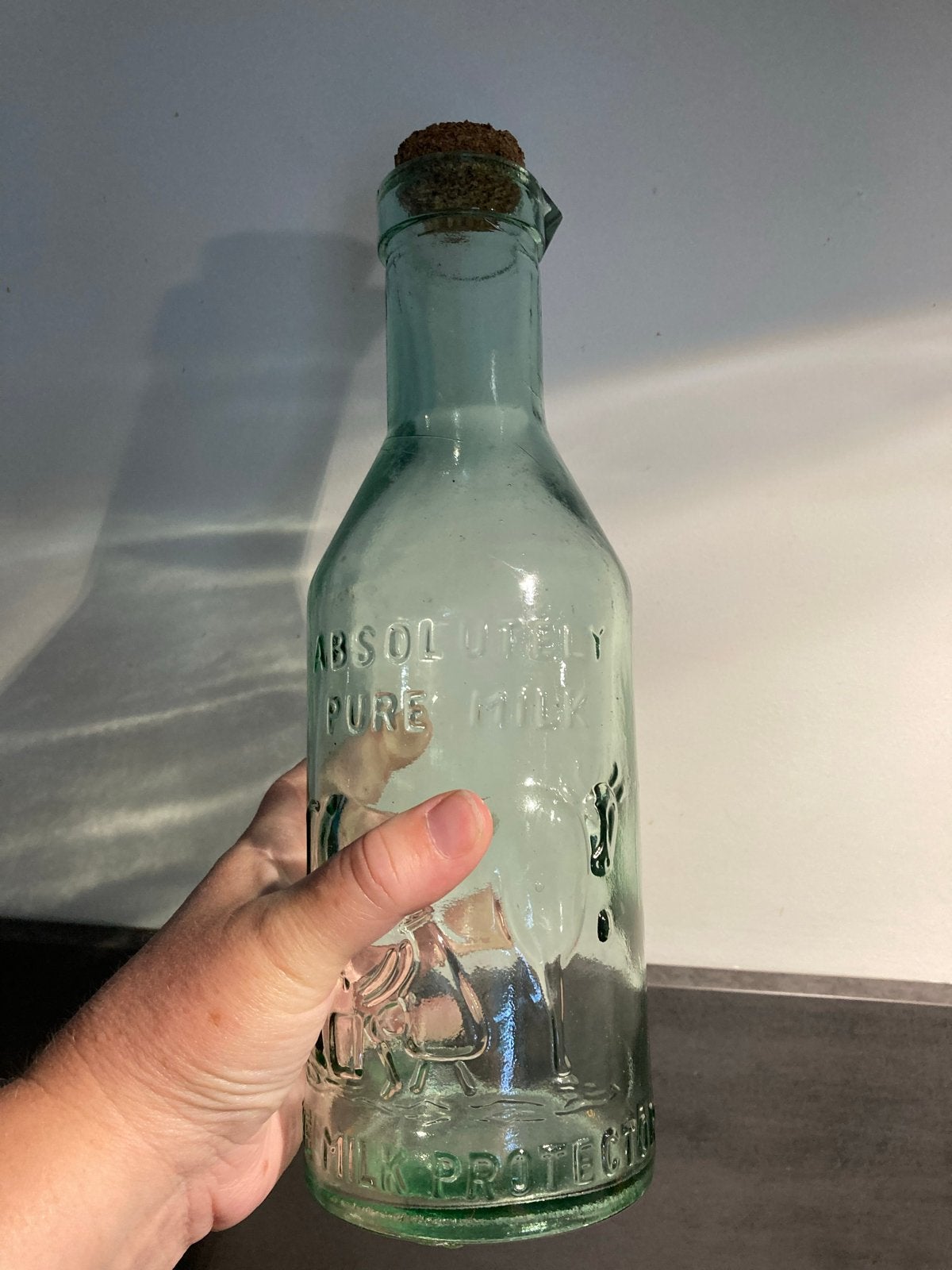 Antieke melkfles "Absolutely Pure Milk" met kurk, Ophalen of Verzenden