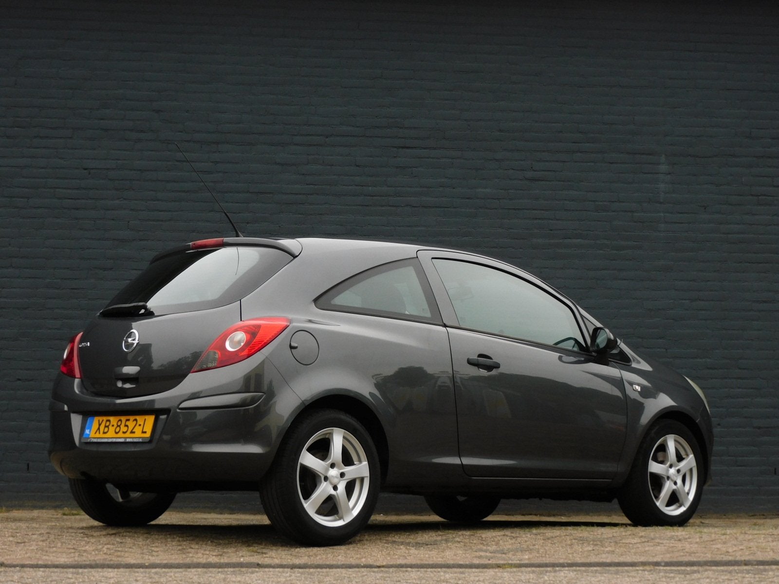 Opel Corsa 1.0-12V Edition NIEUWE DISTRIBUTIE! NET ONDERHOUD, Voorwielaandrijving, Euro 5, Zwart, Elektrische ramen