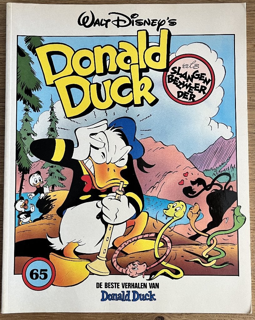 Donald Duck als slangenbezweerder -65-1e dr(1991) - Strip, Boeken, Meerdere stripboeken, Ophalen of Verzenden, Zo goed als nieuw