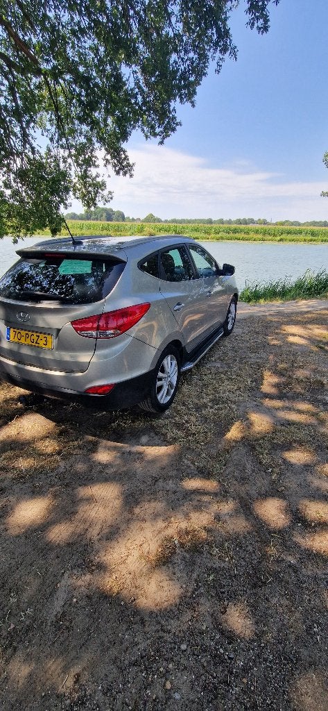 Hyundai iX35 2.0i Cvvt 163pk Aut. 2011 Grijs, Auto's, Hyundai, Navigatiesysteem, Zwart, 4 cilinders, 163 pk