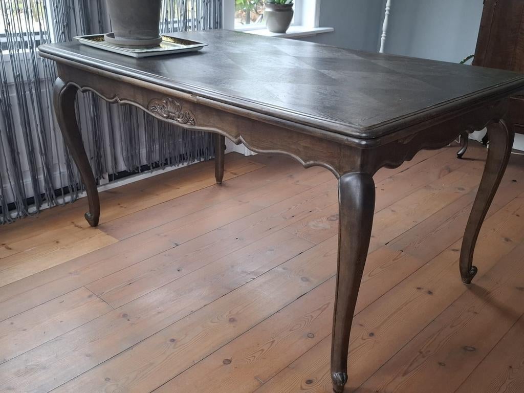 Grote uitschuifbare eettafel, Ophalen