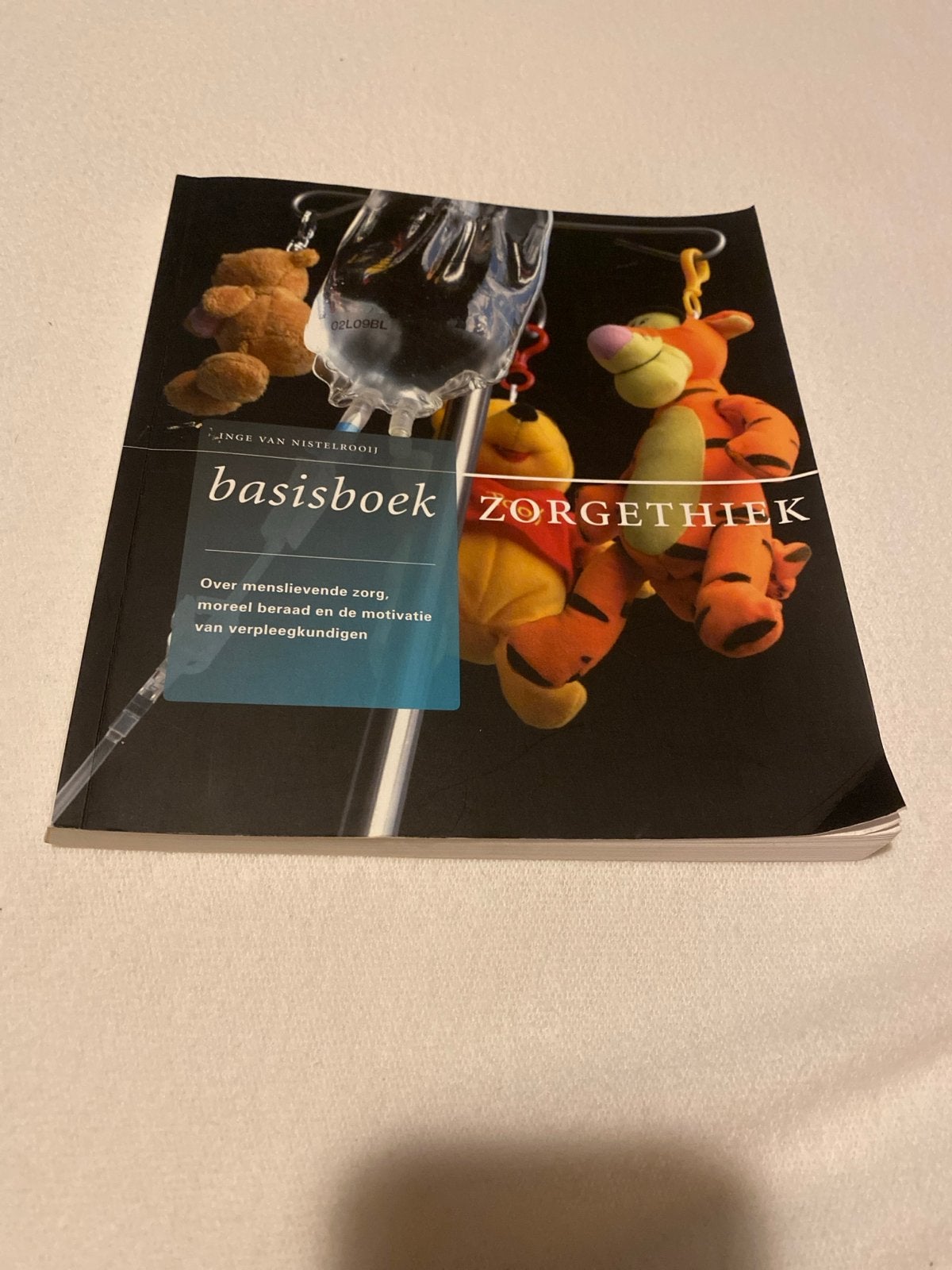 Basisboek Zorgethiek - Inge van Nistelrooij, Ophalen of Verzenden, Gelezen, Overige typen