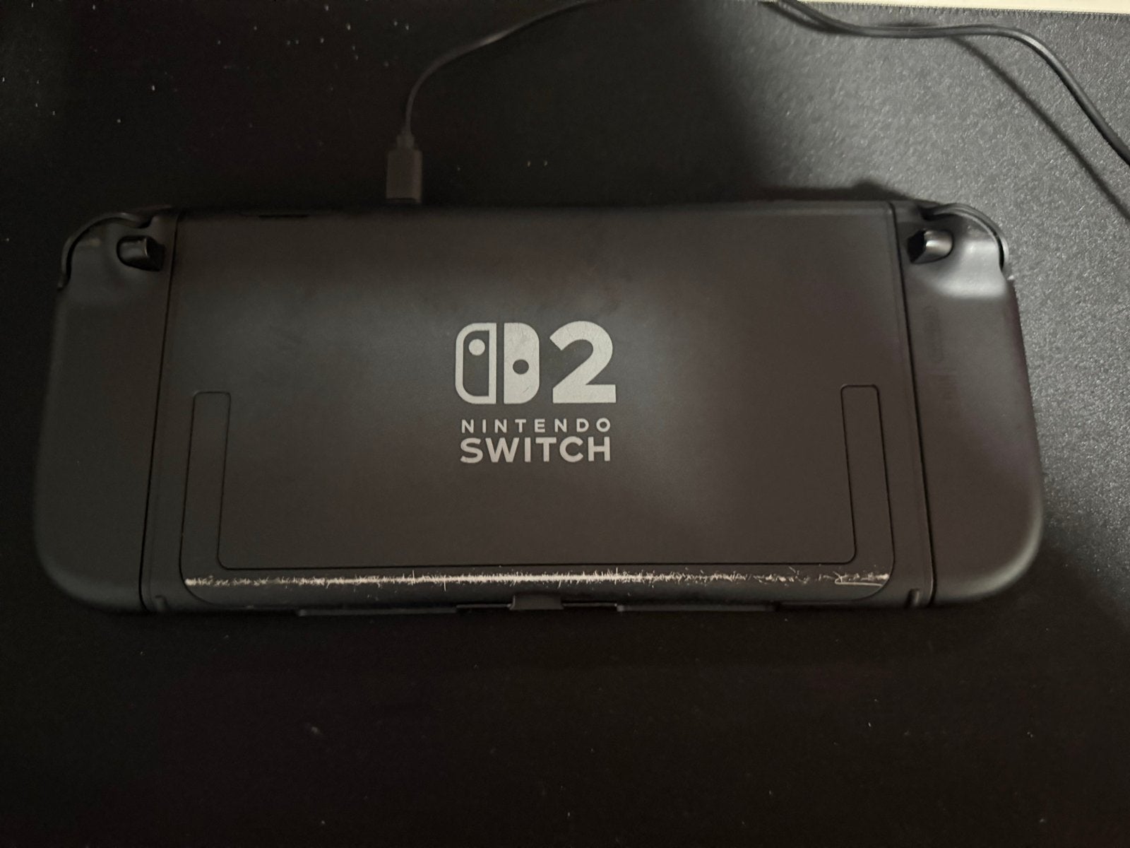 Foto 3 van Nintendo Switch 2 met doos , hoes en Mario Kart World
