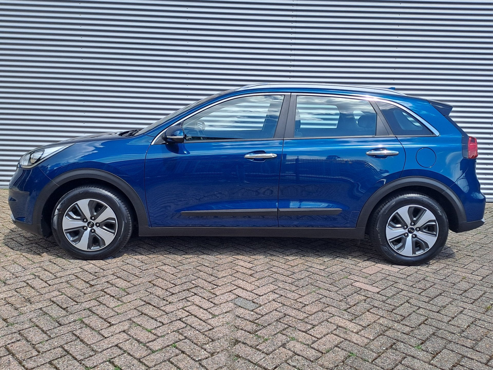 Kia Niro 1.6 GDi Hybrid DynamicLine | Automaat | Navi | Came, Auto's, 12 maanden, Gebruikt, Euro 6, Blauw