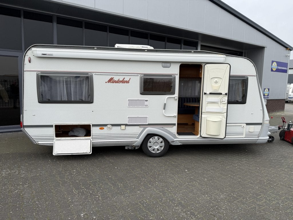 LMC Munsterland 495 E Aparte bedden 205cm Airco Mover Luifel, Caravans en Kamperen, Caravans, Standaardzit, Lengtebed, 4 tot 5 meter