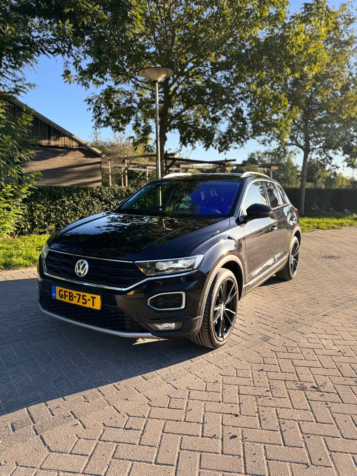 Volkswagen T-Roc sport 1.5 TSI 190 pk 7-DSG 2018 Zwart, Auto's, 1498 cc, Leder en Stof, Zwart, 19 km/l