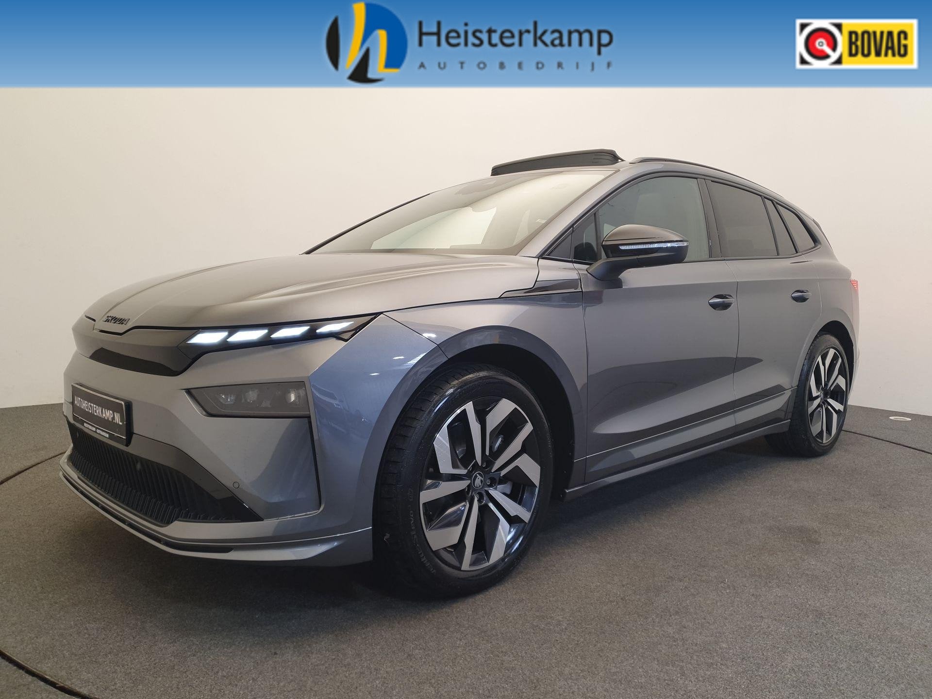 SKODA Enyaq 85 Sportline 82 kWh 286pk Wegklapbare trekhaak,, Auto's, 12 maanden, 510 min, Zwart, 82 kWh