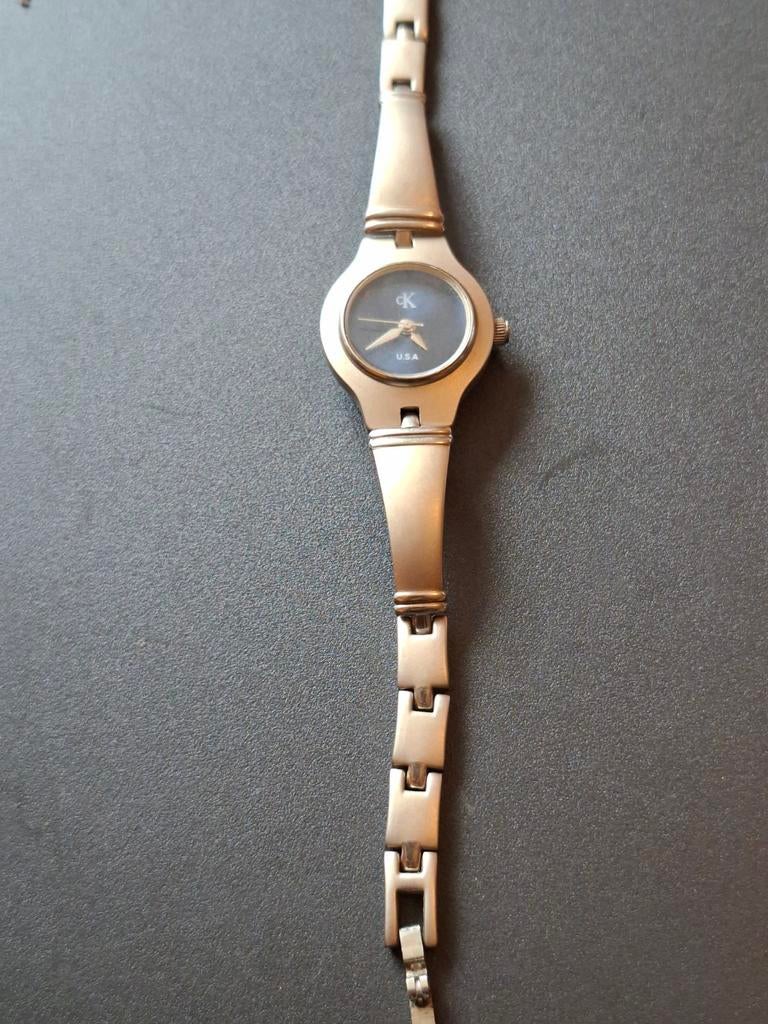 Klokje ck, Sieraden, Tassen en Uiterlijk, Horloges | Dames, Ophalen of Verzenden, Zo goed als nieuw, Staal, Overige merken