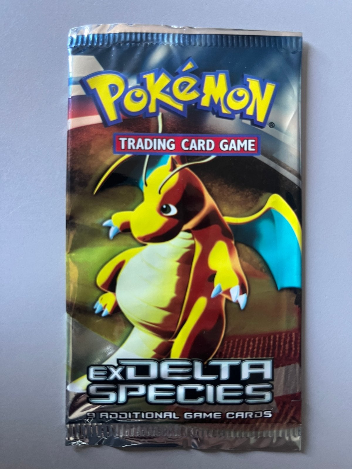 Pokemon booster empty ex delta species dragonite, Ophalen of Verzenden, Gebruikt, Booster
