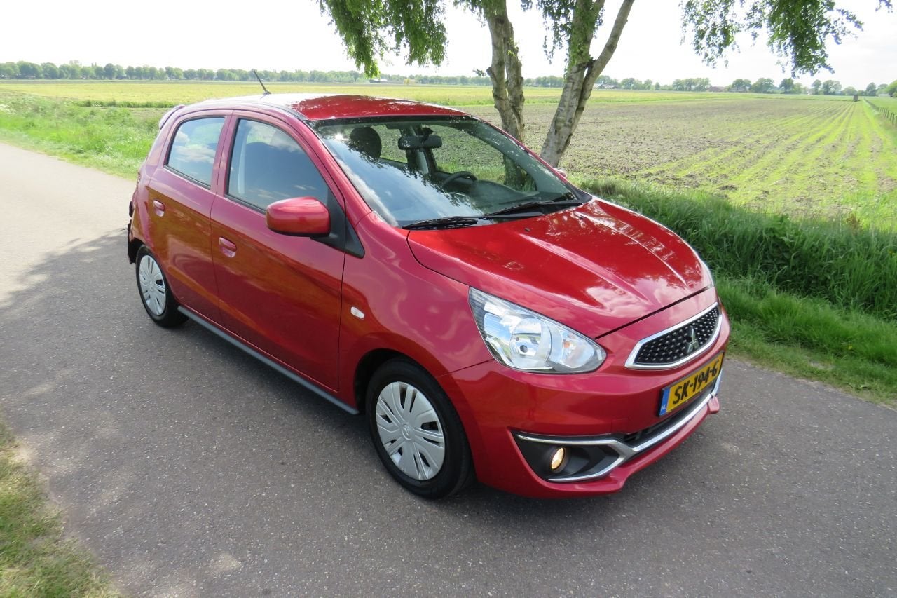 Mitsubishi Space Star 1.0 70pk 5drs Cool + 35.000km nap Airc, Auto diversen, Handgeschakeld, Mitsubishi, Benzine, Rood