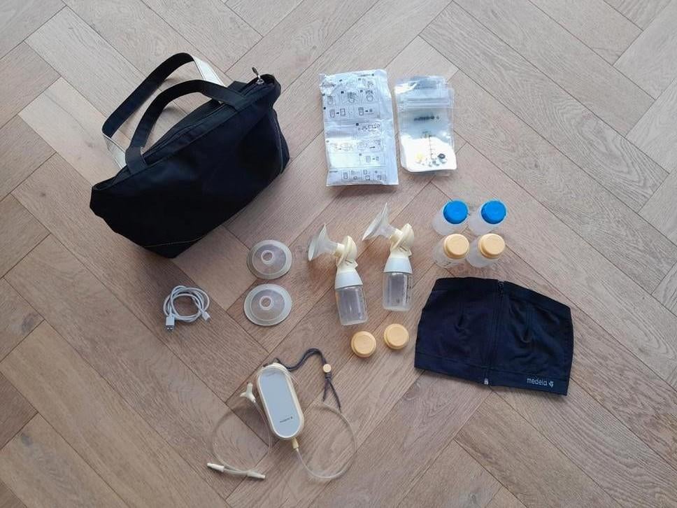 Medela Freestyle Flex Dubbele Borstkolf + Extra's, Ophalen of Verzenden, Gebruikt, Borstkolf