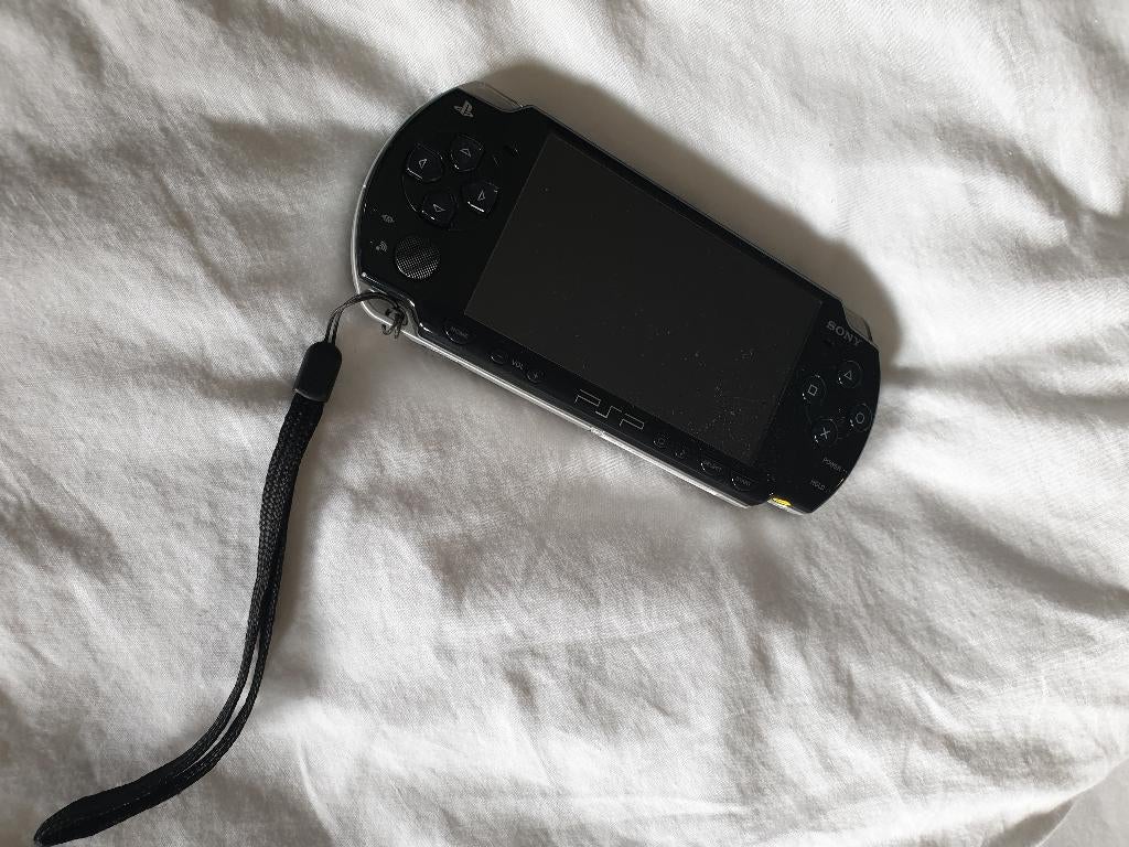 SONY portable playstation, Ophalen, Met games, Zwart, Zo goed als nieuw
