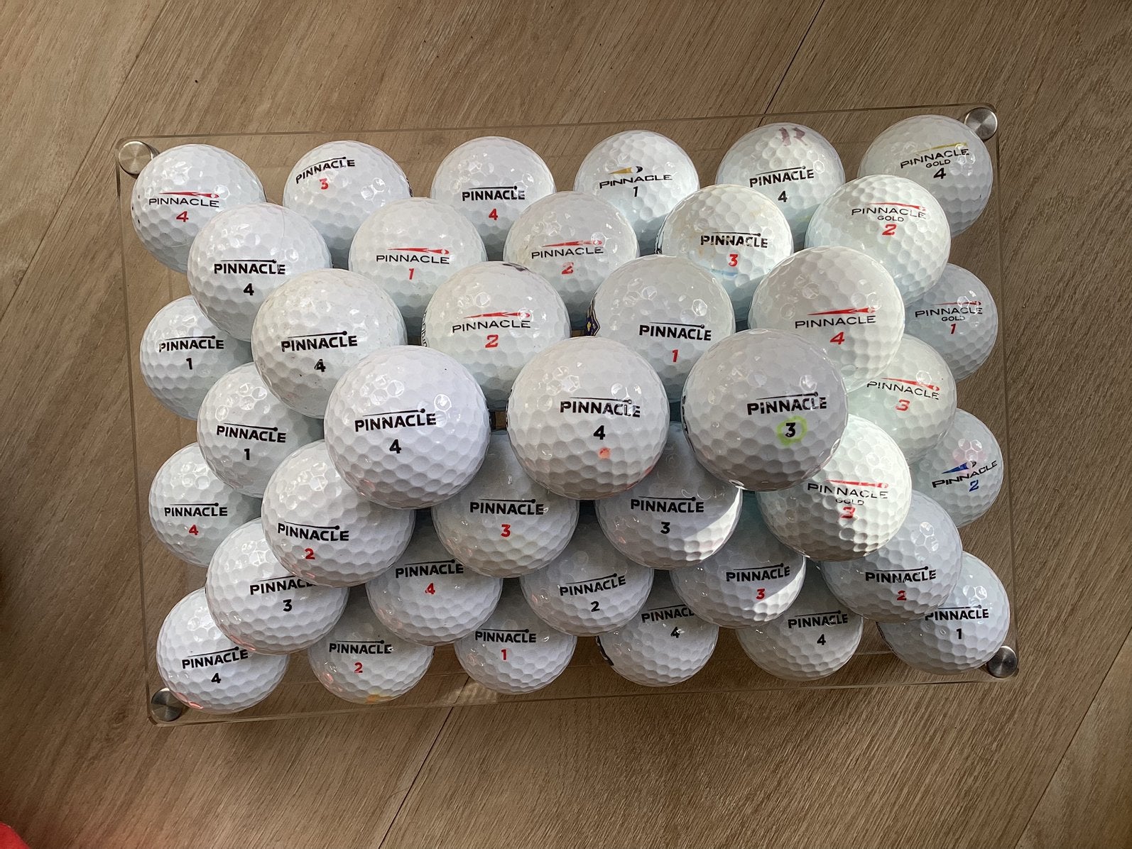 100 hele mooie Pinnacle golfballen, Ophalen of Verzenden, Zo goed als nieuw, Bal(len)