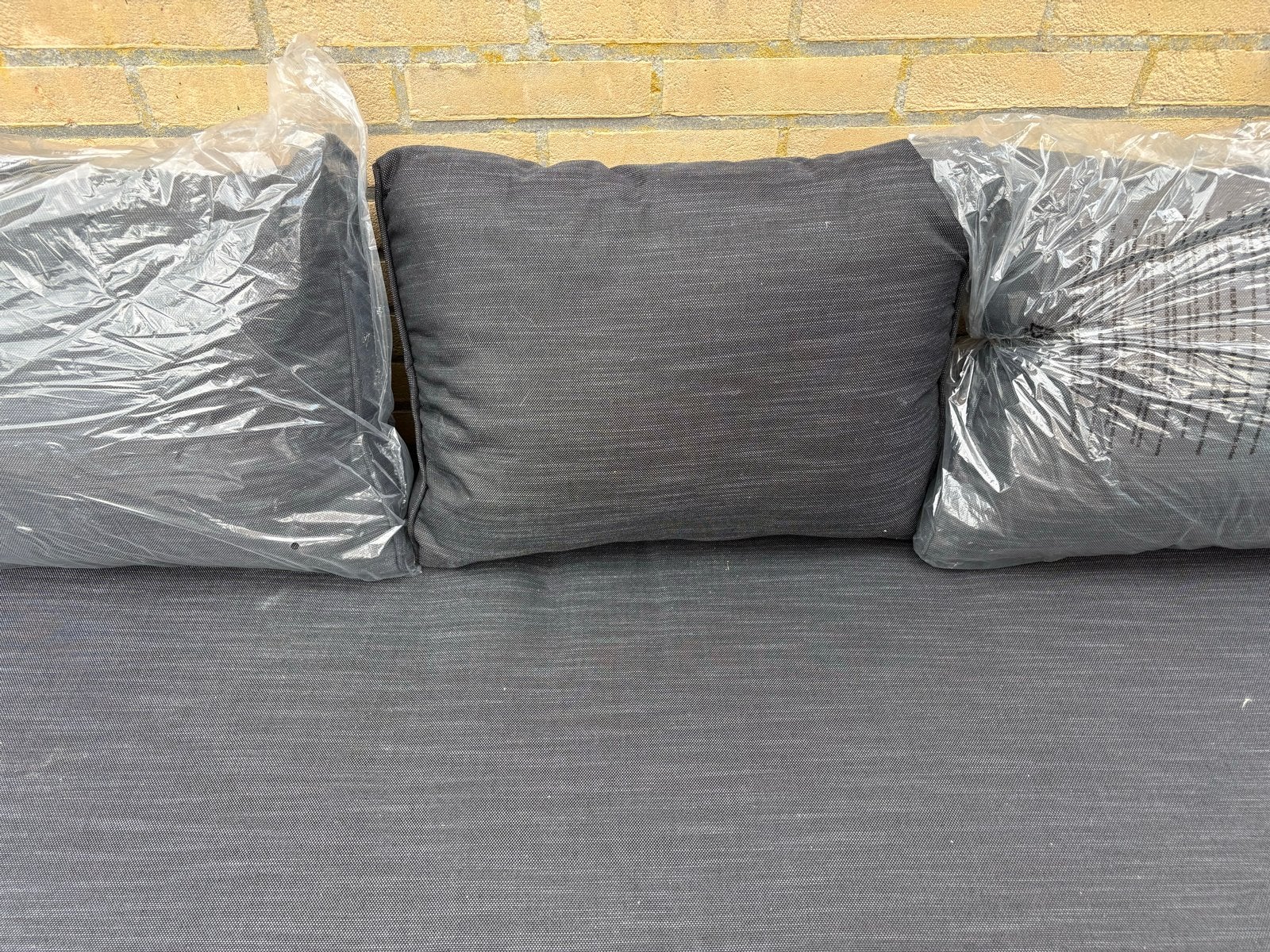 Grijze tuinkussens voor bank of lounge set, Ophalen, Nieuw, Overige materialen