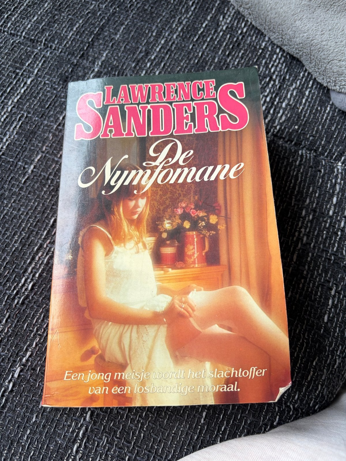 Lawrence Sanders - De Nymfomane (Paperback), Boeken, Ophalen of Verzenden, Zo goed als nieuw, Nederland