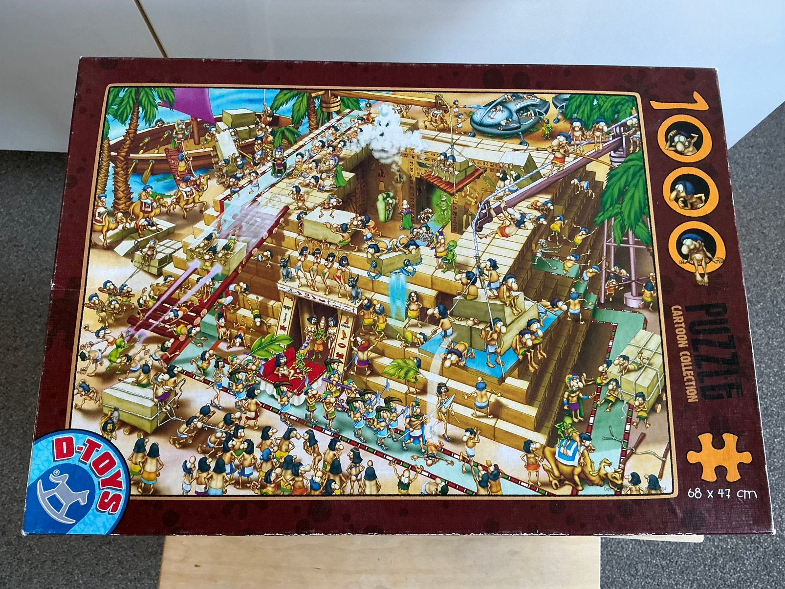 Cartoon Puzzel Bouw Pyramide hilarisch Egypte chaos 1000 st., Hobby en Vrije tijd, Ophalen of Verzenden, 500 t/m 1500 stukjes