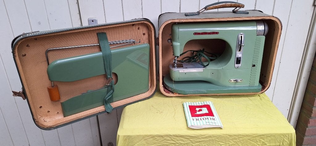 Elektrische naaimachine, Ophalen